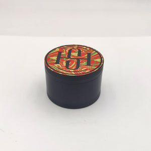 
                  
                    Load image into Gallery viewer, High Society - 4 PC 50mm Ceramic Teflon Coated Grinder - Rasta
                  
                